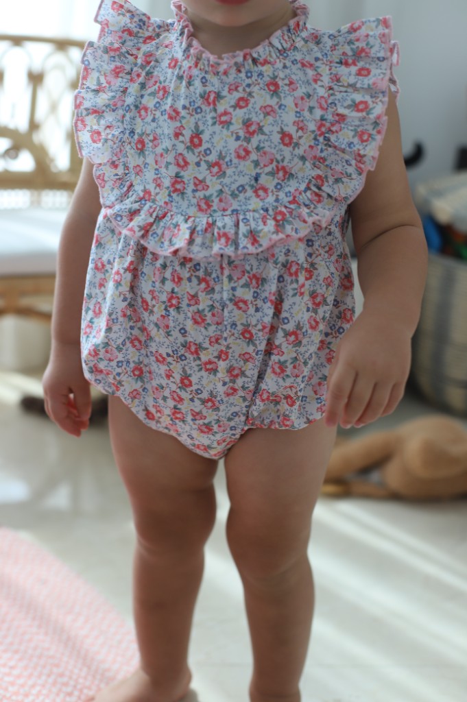The Craft — floral romper detail